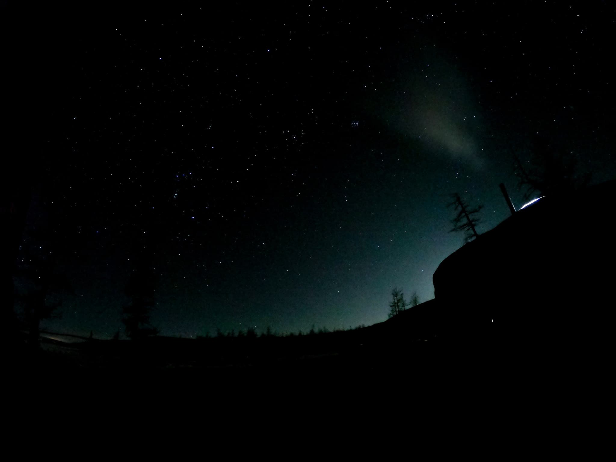 Night sky over a steppe ger camp